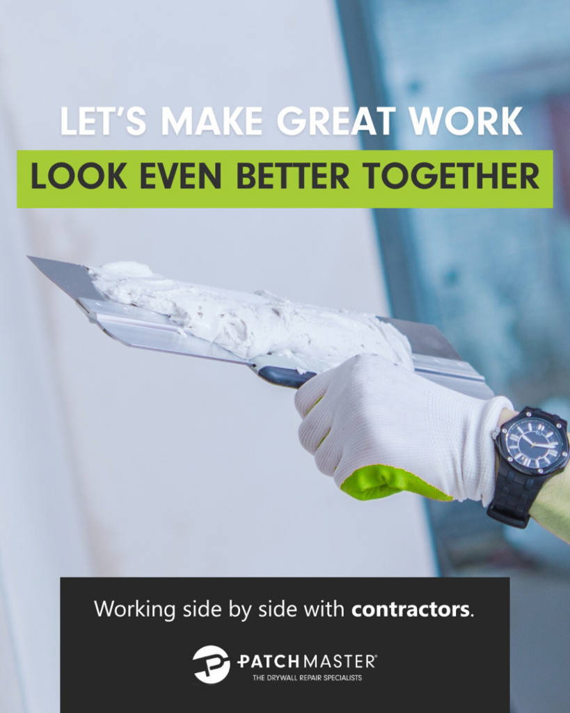 A handyman's gloved hand holding a drywall knife with joint compound, ready for application by PatchMaster Saint Charles County in O'Fallon, MO.