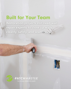 A handyman's hand applying joint compound to a drywall seam with a trowel, performing repair for PatchMaster Saint Charles County in O'Fallon, MO.