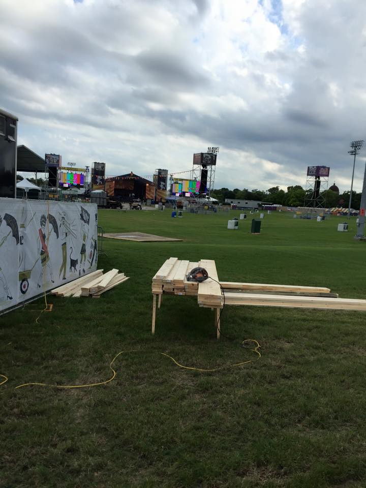 A handyman from Titans of Industry, LLC cutting lumber with a circular saw for a project in New Orleans, LA.