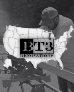 A handyman cutting wood with a saw, representing the work done by BT3 Renovations in Dayton, OH.