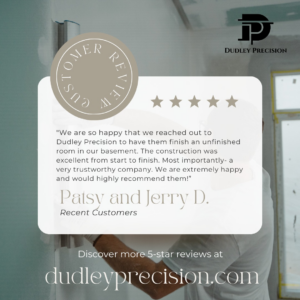 A handyman working on finishing a basement wall, demonstrating renovation services by Dudley Precision in Denver, CO.