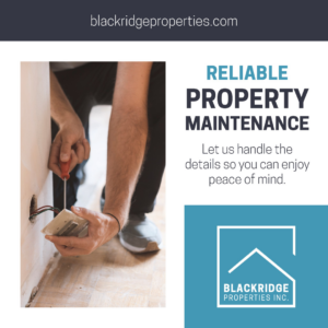 A handyman from Blackridge Properties repairing an electrical outlet in Cumberland, RI.