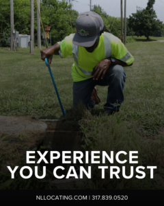 A handyman from Northern Lights Locating & Inspection performing utility locating in Plainfield, IN.