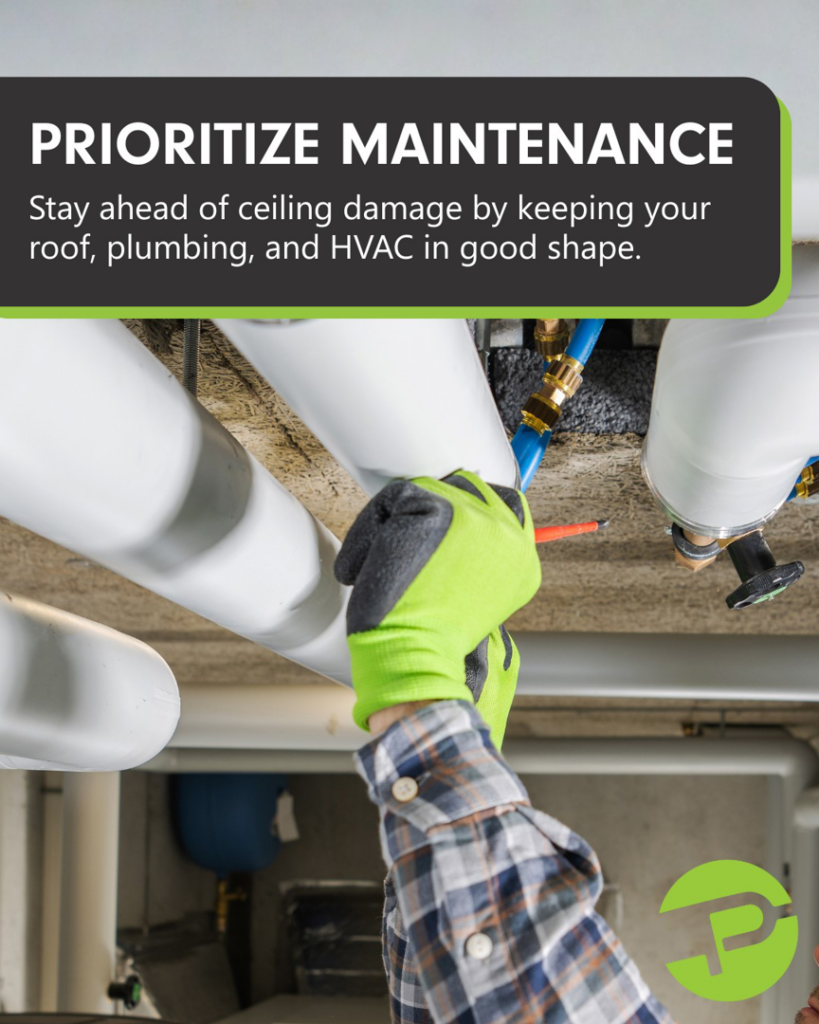 A handyman in gloves working on pipes and plumbing in a ceiling, performing maintenance for PatchMaster Richmond West in Richmond, VA.