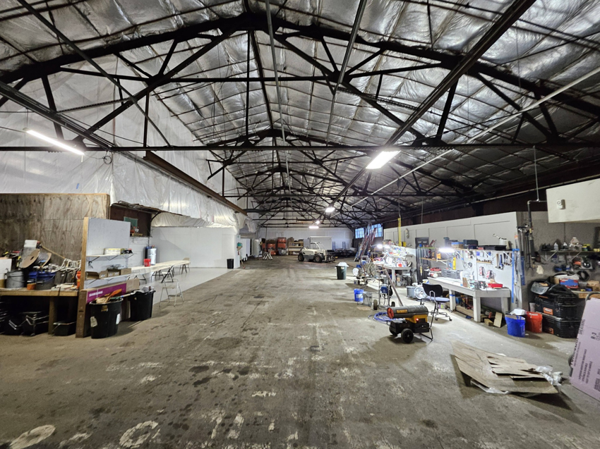A spacious handyman workshop with various tools and equipment, ready for projects at Ridge Painting, LLC in Louisville, KY.