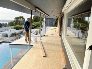 Handymen from Gregg Hoffman Construction Inc. building a new outdoor deck in Tacoma, WA