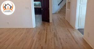 Professional hardwood floor installation in a hallway and room by DC HOME improvement LLC in Orlando, FL.