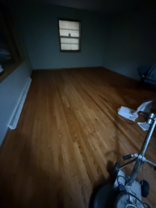 Hardwood floor sanding equipment in a room, ready for a handyman job by Vera Flooring in Grand Rapids, MI.
