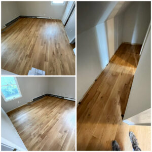 New hardwood flooring installation in a room and hallway by PTA Construction INC. in Jersey City, NJ.