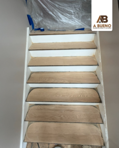 Hardwood stair treads being refinished by Bueno Hardwood Floors in Fairfield, CT