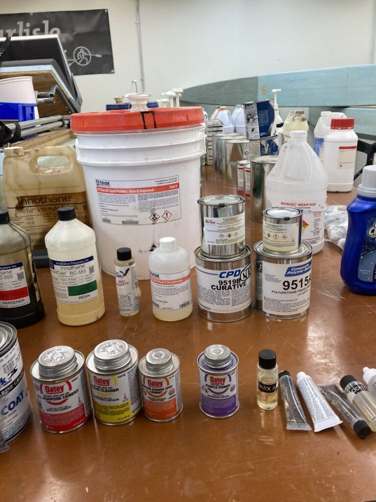 A collection of hazardous waste containers ready for removal by Maine Labpack, Inc. in South Portland, ME