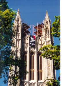 A historic building undergoing renovation with extensive scaffolding and a Lorenzon Brothers Company banner, showcasing general contractor work in Philadelphia, PA.