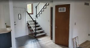 A renovated home entryway featuring new flooring and fresh paint by Constructed by 360 LLC in Meridian, ID.
