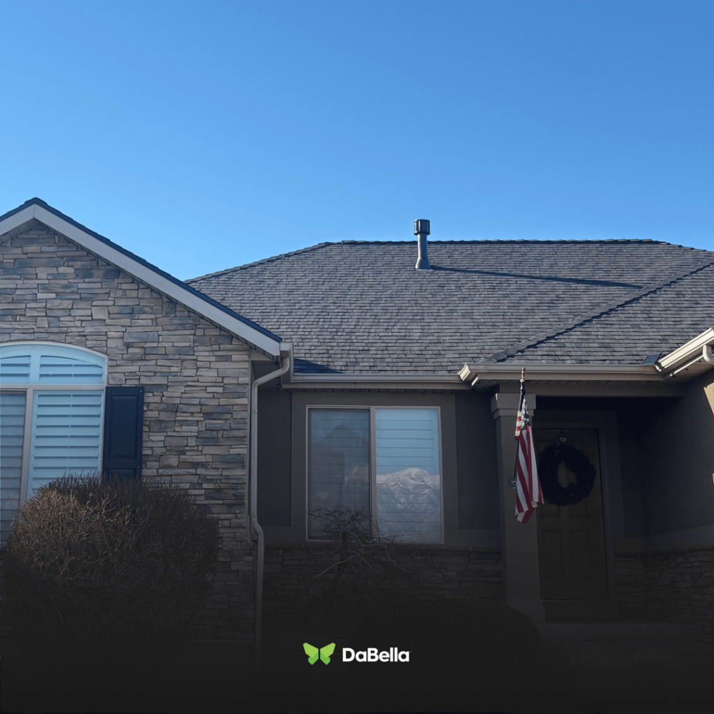The exterior of a home featuring new roofing, siding, and gutters installed by DaBella in Minneapolis, MN.