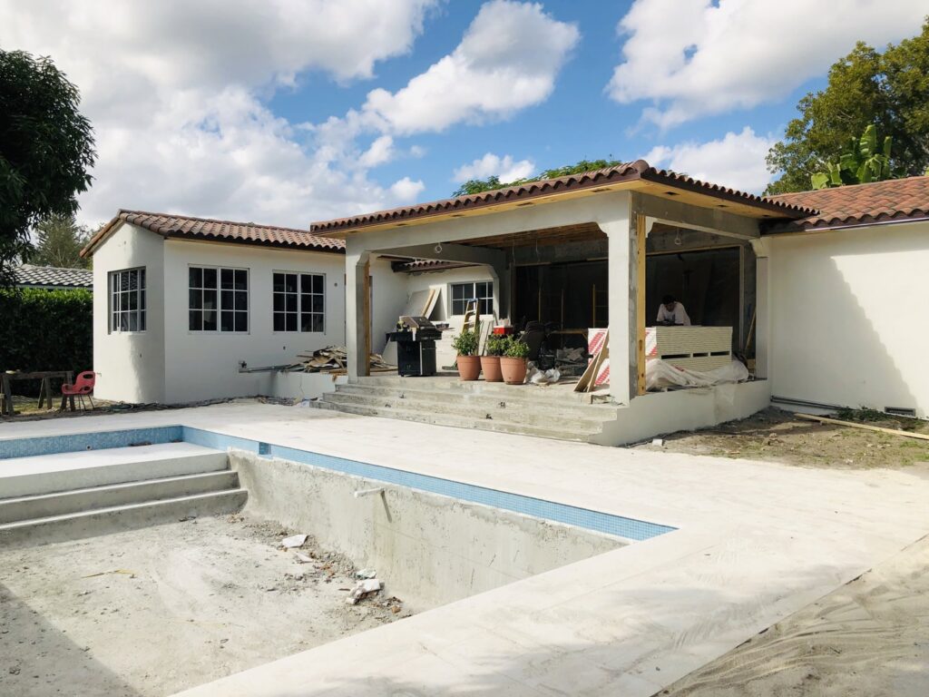 A home renovation and pool construction project in progress, managed by BAFCO POOLS in Hialeah, FL.