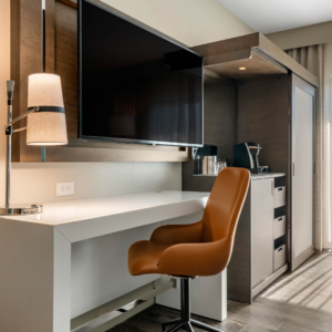 A modern hotel room interior, a completed project by LEMA Construction, Inc. in Saint Petersburg, FL.