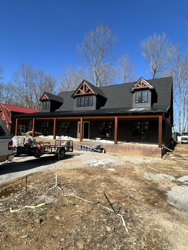 A house under construction or major renovation, showcasing a project managed by PrimeTime Painting in Bowling Green, KY.
