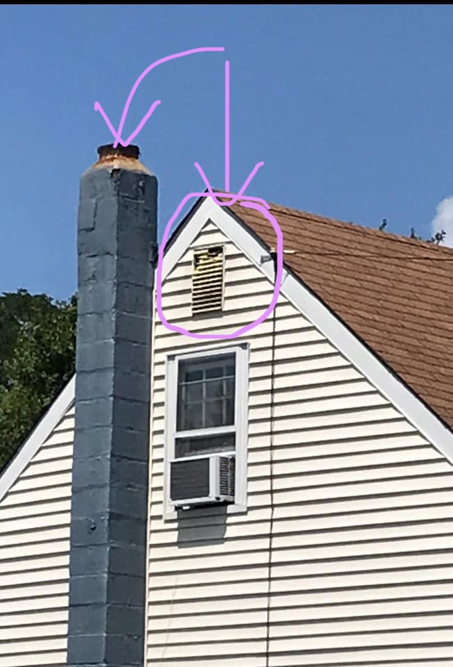 Exterior house view with chimney and attic vent, indicating inspection by AJS Contracting & Improvements LLC in Toms River, NJ.