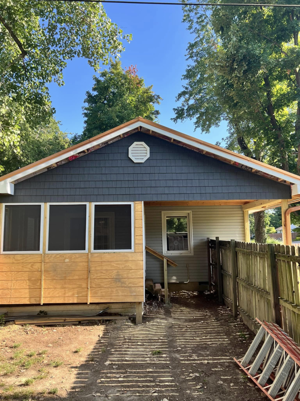 Exterior of a house with new siding and fascia installed during remodeling by R&R Foundation and remodeling in Owensboro, KY