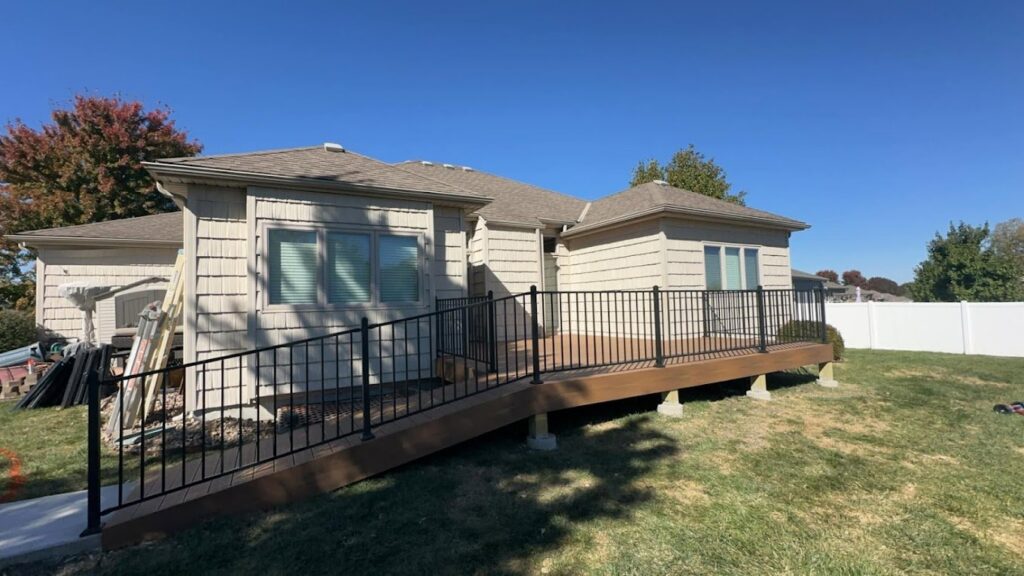 A house featuring a new deck and an accessibility ramp installed by Deckscape KC in Kansas City, MO.