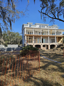A large house undergoing renovation or construction, a service provided by Lowcountry Current LLC in Moncks Corner, SC.