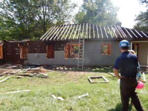 A house undergoing renovation with roof framing exposed by Paul Davis Restoration of Charlotte, NC.