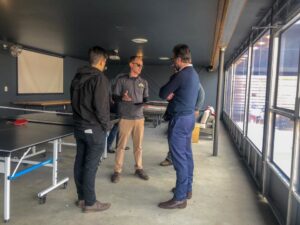 A residential roofing project in progress with multiple workers by Southern Roofing and Renovations Clarksville in Orlando, FL.