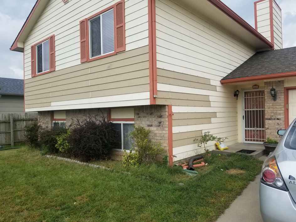 Exterior house siding repair and replacement by Chris's Handyman Services in Wichita, KS
