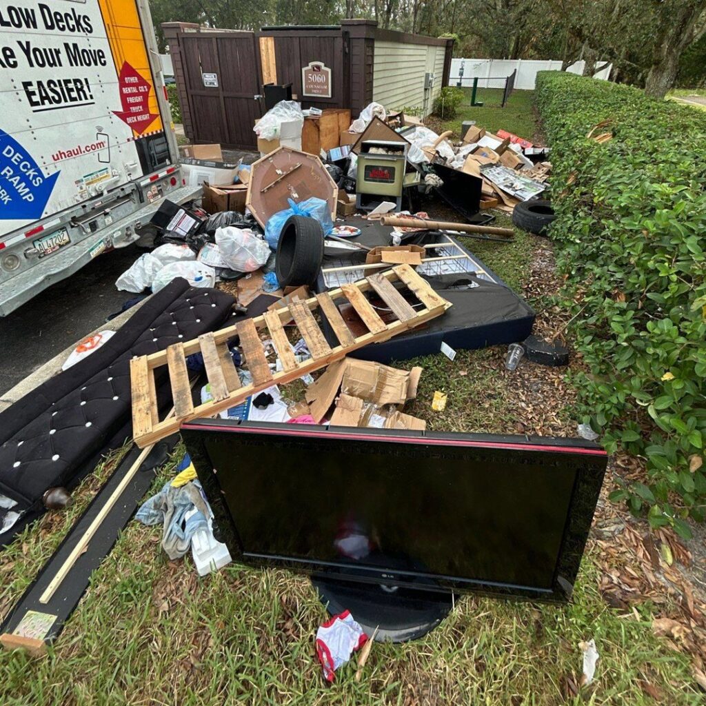 Household junk including a TV, mattress, and boxes piled up for removal by Veterans Easy Trash: Atlanta in Atlanta, GA.