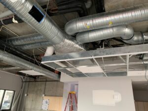 Large HVAC ductwork and ceiling grid installation in a commercial space by Snyder Solutions LLC in Richmond, VA