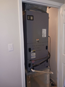 An indoor HVAC furnace unit with filter maintenance notes from Stivers HVAC in Lexington, KY.