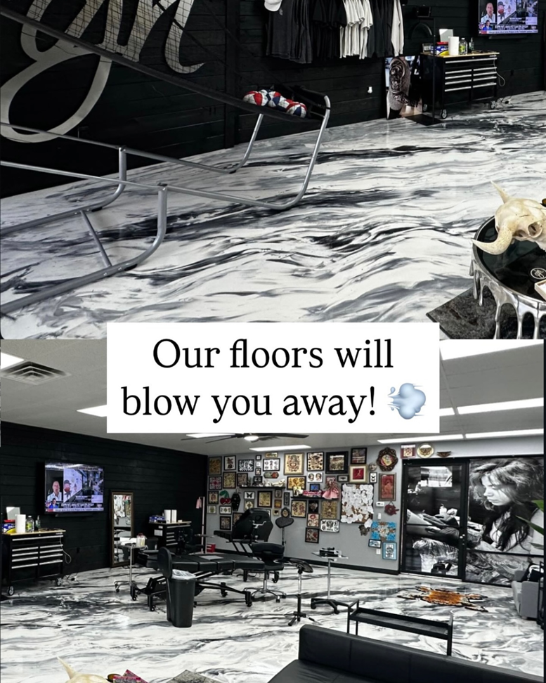 A stunning black and white swirled epoxy floor installed in a commercial space by Savage Coatings in Lakeland, FL.