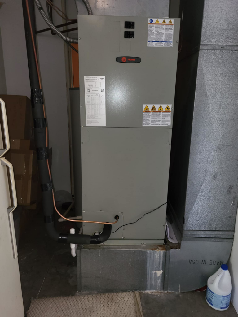 An indoor Trane HVAC furnace and air handler unit installed by Stivers HVAC in Lexington, KY.