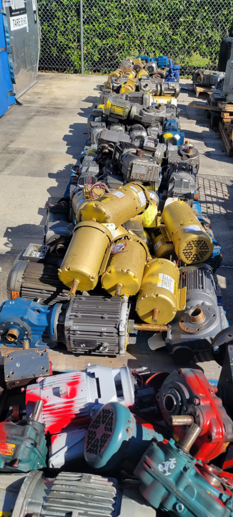 Industrial electric motors and gearboxes ready for recycling by Jugganott Recycling, LLC in Orlando, FL.