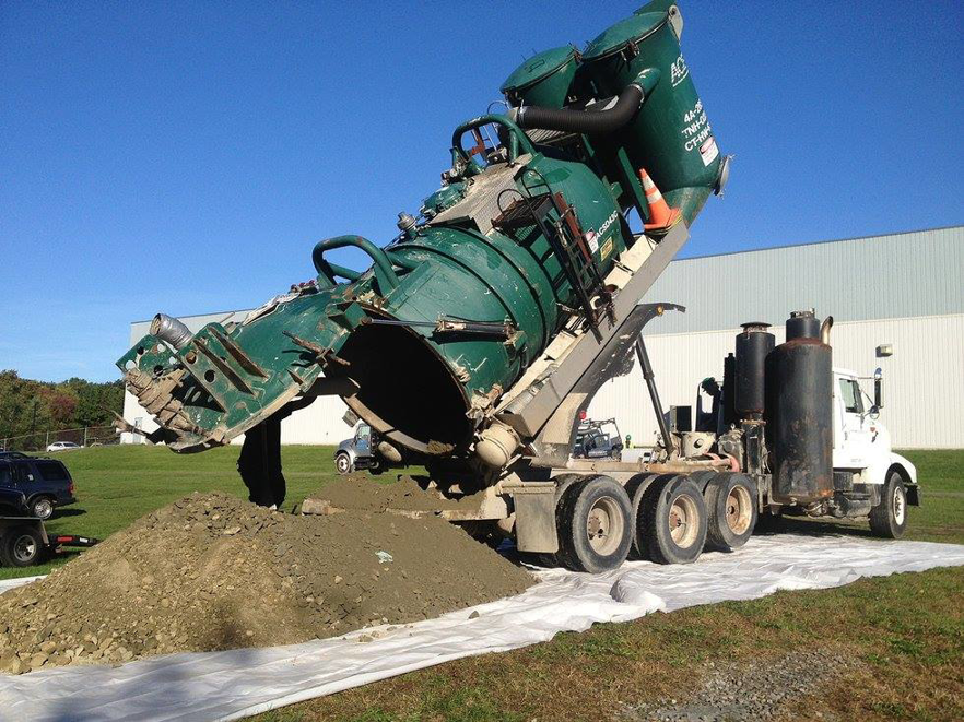 An industrial vacuum truck performing excavation work for Precision Industrial Maintenance, Inc. in Schenectady, NY.