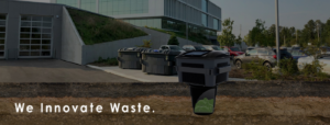 Innovative waste management bins in a commercial parking lot by Binova Group in Knoxville, TN.