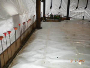 Interior construction floor preparation with protective sheeting, rebar, and structural beams by Crown Waterproofing Inc. Mount Vernon, NY.