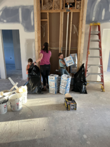 An interior room under construction with drywall, framing, and plumbing visible by Cord Construction in Winchester, KY