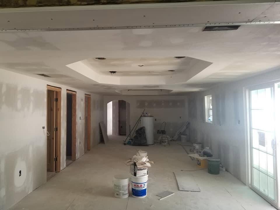Interior drywall installation in progress during a home renovation by Hill Renovations LLC in Athens, GA