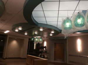 An interior finishing project featuring a decorative ceiling and pendant lights by Combs Interior Specialties in Columbus, OH.