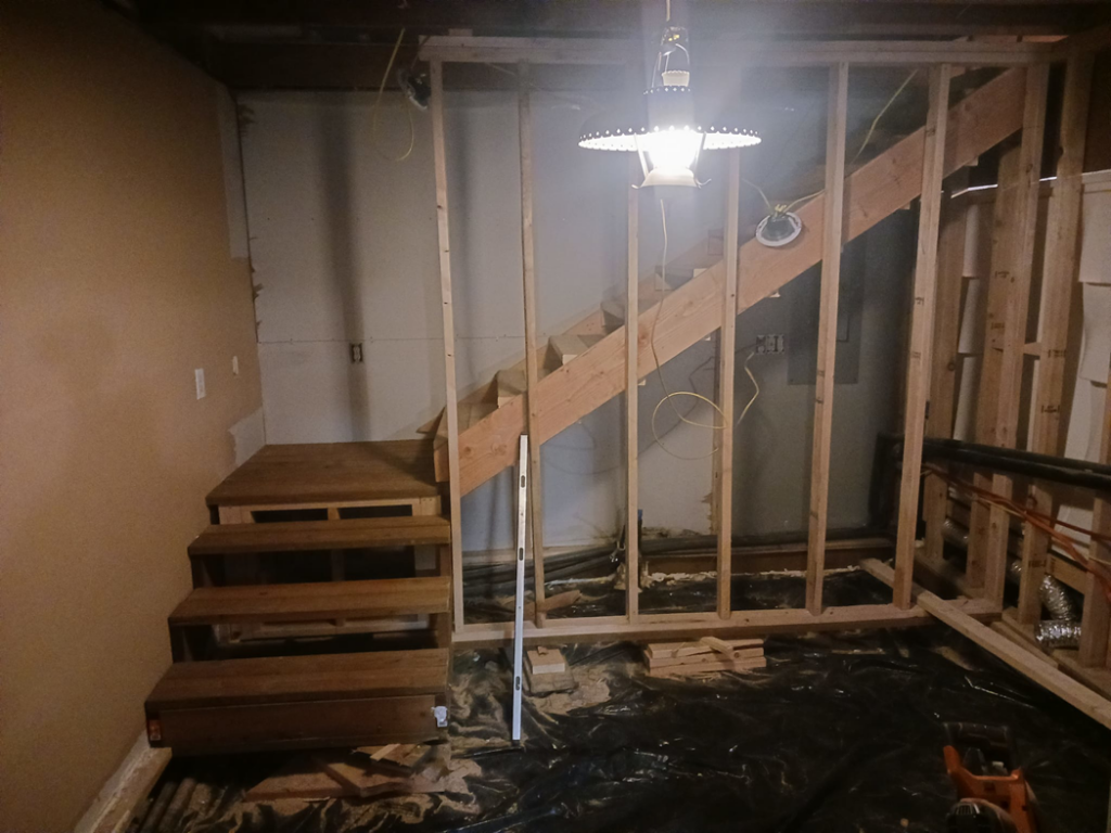 Interior framing for walls and a new staircase under construction by RS handyman llc in Kenai, AK.