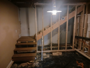 Interior framing for walls and a new staircase under construction by RS handyman llc in Kenai, AK.
