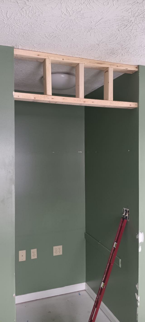 Interior framing work with electrical outlets visible, part of a handyman renovation project by NewEra Construction & Solutions in Lexington, KY