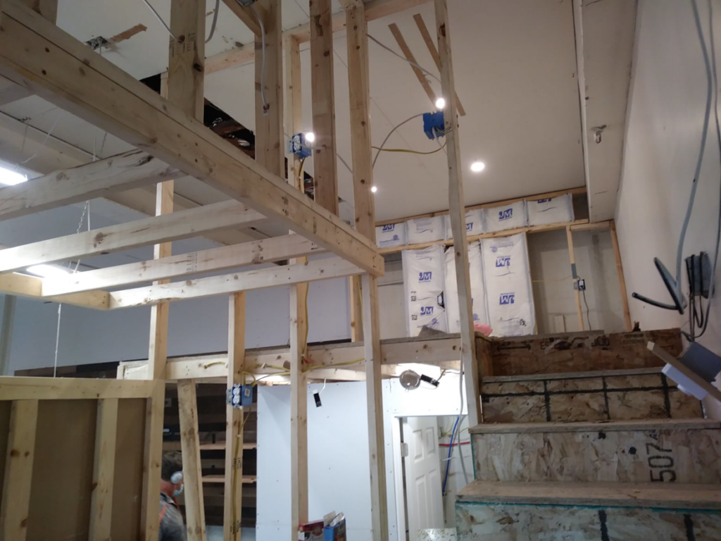 Interior framing and insulation work in progress during a construction project by Doug's Handyman Service in Sioux Falls, SD.