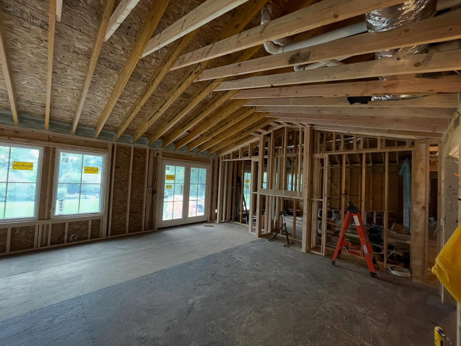Interior framing for a new home construction project by Rochester Remodeling and Home Builders in Rochester, NY.