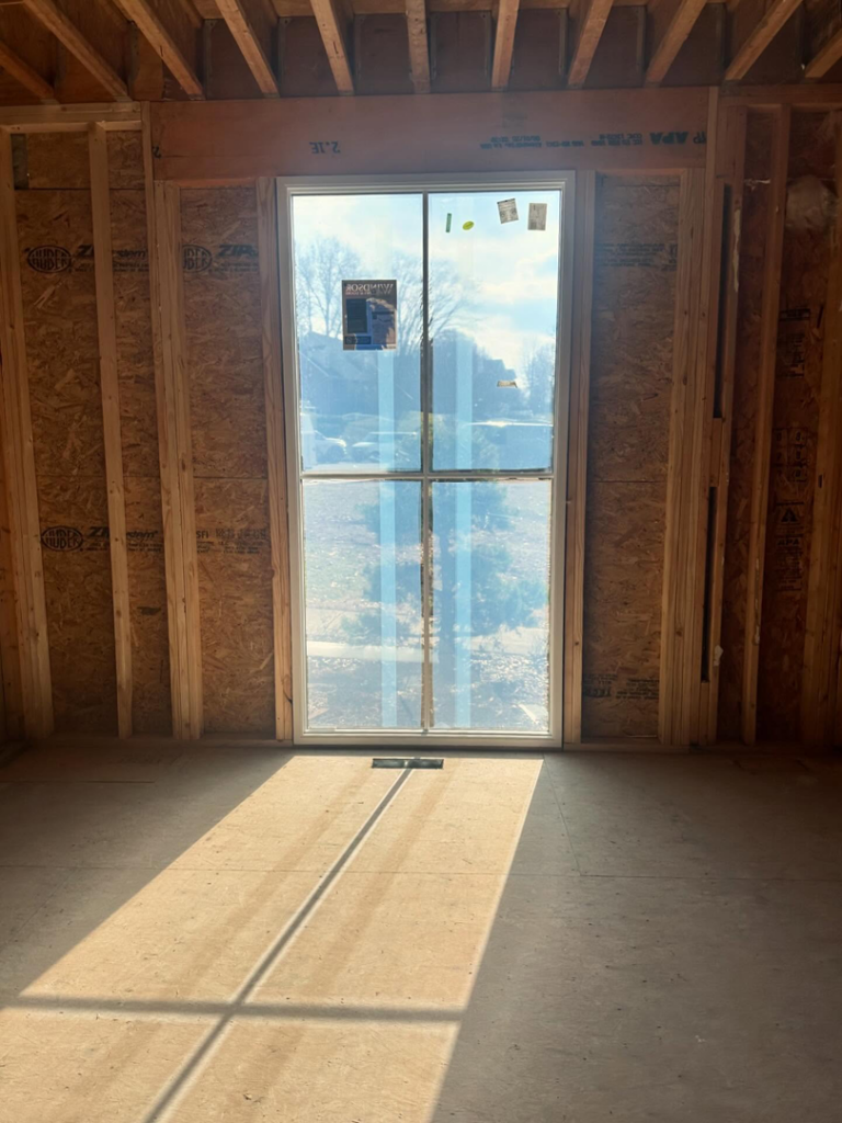 Interior framing and new window installation in a home by Begley Development LLC in Kingsport, TN