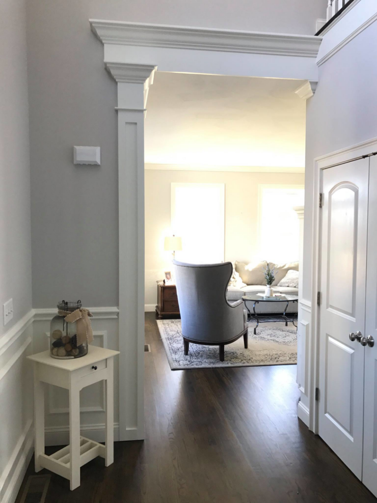 A beautifully finished interior hallway with decorative trim and millwork by O'Shaughnessy Construction in Salem, NH.