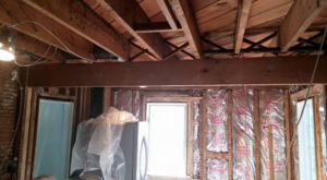 Interior home renovation showing exposed beams and framing by Thomas J Stone GC in Yonkers, NY