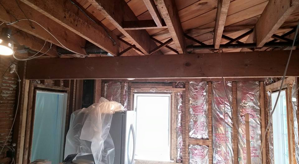 Interior home renovation showing exposed beams and framing by Thomas J Stone GC in Yonkers, NY