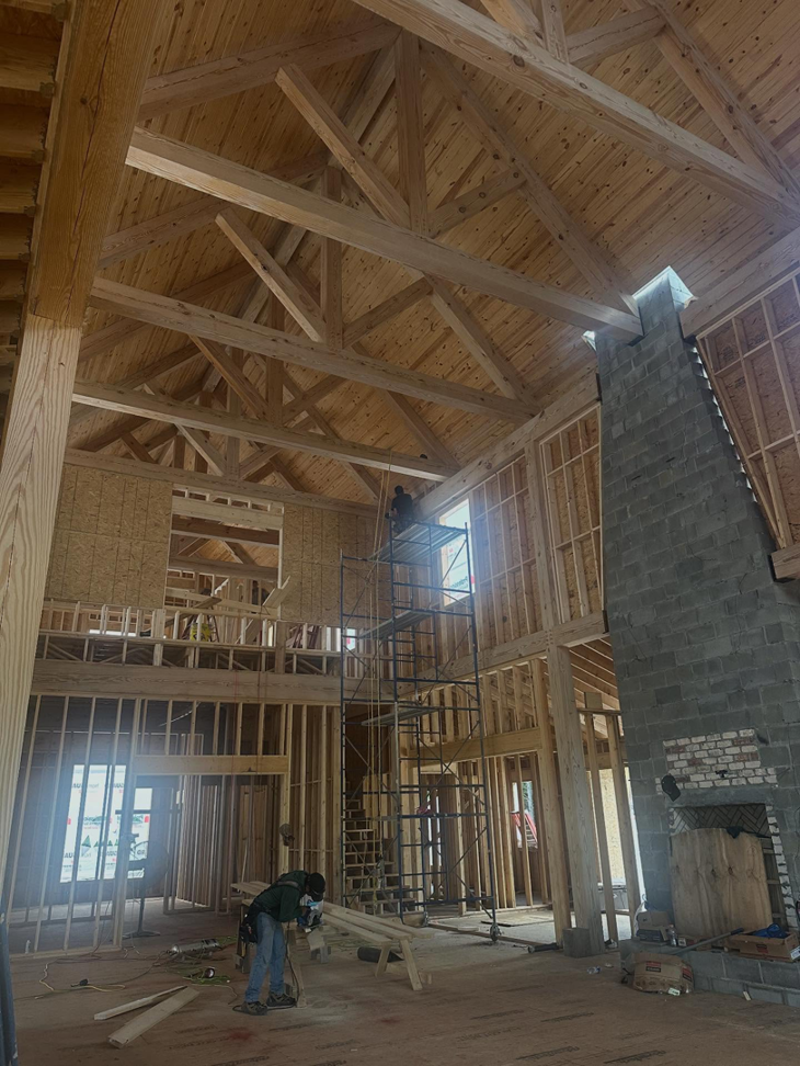 Interior house framing and construction with scaffolding by Capital Construction & Contracting LLC in Raleigh, NC